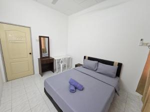 Postel nebo postele na pokoji v ubytování Sunrise Hostel