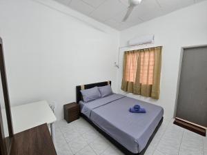 Postel nebo postele na pokoji v ubytování Sunrise Hostel