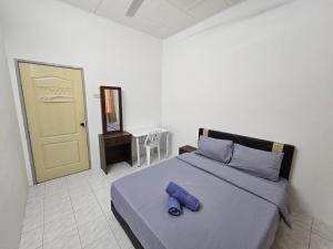 Postel nebo postele na pokoji v ubytování Sunrise Hostel