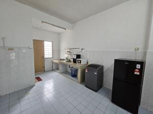 Kuchyň nebo kuchyňský kout v ubytování Sunrise Hostel