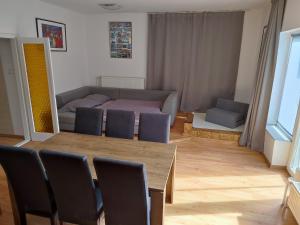 Posezení v ubytování Aranyharmat Apartman Eu