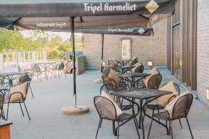 Restoran või mõni muu söögikoht majutusasutuses Vakantiedomein Hoge Duin