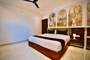 Ένα ή περισσότερα κρεβάτια σε δωμάτιο στο Hotel The Code Exclusive