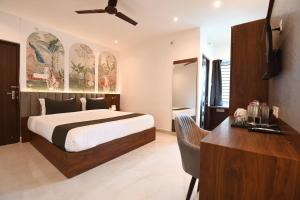 Ένα ή περισσότερα κρεβάτια σε δωμάτιο στο Hotel The Code Exclusive