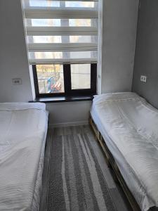 Postel nebo postele na pokoji v ubytování Yurt Camp КӨNӨK