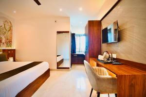 Ένα ή περισσότερα κρεβάτια σε δωμάτιο στο Hotel The Code Exclusive