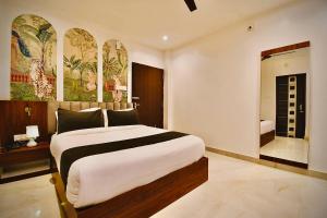 Ένα ή περισσότερα κρεβάτια σε δωμάτιο στο Hotel The Code Exclusive