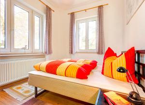 En eller flere senge i et værelse på Villa Lübcke, Fewo 4