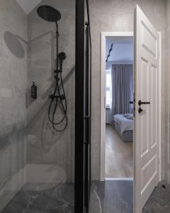 Posteľ alebo postele v izbe v ubytovaní Glow Apartments - Apartamenty Studio KOZIA Gdańsk Śródmieście