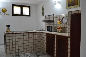 Kuchyň nebo kuchyňský kout v ubytování TAVERNETTA DEL BORGO