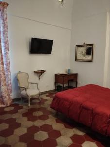 TV a/nebo společenská místnost v ubytování Casa Mazzini di Casa Italia