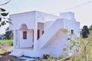 Φωτογραφία από το άλμπουμ του Tiru Arunachala Retreat House σε Tiruvannamalai