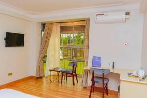TV a/nebo společenská místnost v ubytování NIBA Hotel + 26 fotografií