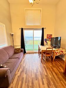 TV a/nebo společenská místnost v ubytování Resort Lac Ste-Marie