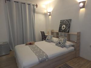 Letto o letti in una camera di OR Saison