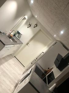 Kuchyň nebo kuchyňský kout v ubytování Tranevejs hytten