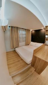 En eller flere senge i et værelse på Japandi Hideaway Antipolo