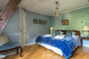 Postel nebo postele na pokoji v ubytování Thorskogs Slott