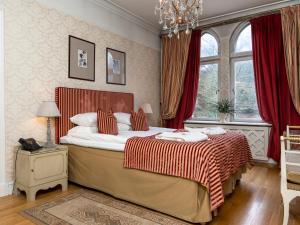 Postel nebo postele na pokoji v ubytování Thorskogs Slott
