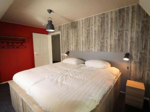 Postel nebo postele na pokoji v ubytování Sfeervolle Vakantieboerderij met sauna