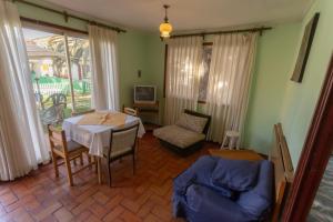 a living room with a table and a couch at Cabañas Yunkai in Vicuña