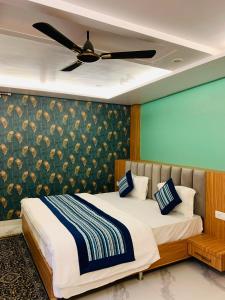 En eller flere senge i et værelse på Heaven Heritage