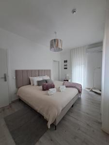 Postel nebo postele na pokoji v ubytování ArouceHostel + 37 fotografií