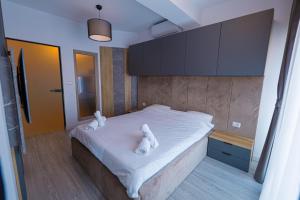 Ένα ή περισσότερα κρεβάτια σε δωμάτιο στο Urban Suite