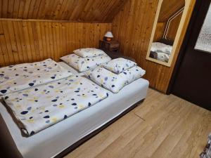 Posteľ alebo postele v izbe v ubytovaní Crystal Sóstó Apartman