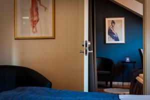 Postel nebo postele na pokoji v ubytování Hotell Aqva Restaurang & Bar Ett Biosfärhotell med fokus på hållbarhet
