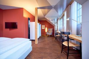 Postel nebo postele na pokoji v ubytování Hotel Arenenberg + 34 fotografií