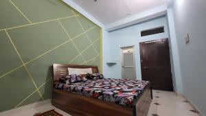 Postel nebo postele na pokoji v ubytování Hotel Mahika
