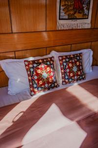 Postel nebo postele na pokoji v ubytování The Destination Homestay