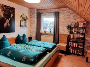 Postel nebo postele na pokoji v ubytování Ferienwohnung an der Bieke