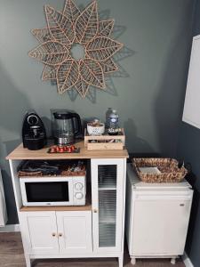 Kuchyň nebo kuchyňský kout v ubytování Chambre d'Hôtes du Vieux Collonges + 14 fotografií