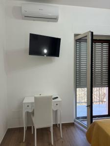 TV a/nebo společenská místnost v ubytování Dente di Leone