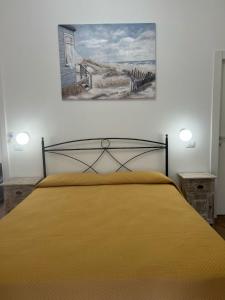Postel nebo postele na pokoji v ubytování Dente di Leone