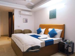 Postel nebo postele na pokoji v ubytování Hotel Blueberry
