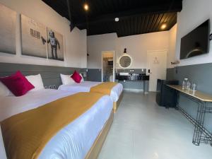 เตียงในห้องที่ Hotel NEXT