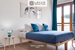 Postel nebo postele na pokoji v ubytování 7Rooms - Lecce Selection