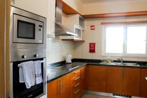 Dapur atau dapur kecil di Casa Steve at OPomar Cabanas de Tavira