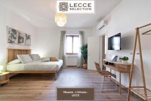 Postel nebo postele na pokoji v ubytování 7Rooms - Lecce Selection