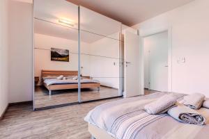 Voodi või voodid majutusasutuse Penthouse in den Bergen toas