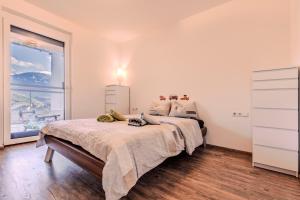 Voodi või voodid majutusasutuse Penthouse in den Bergen toas