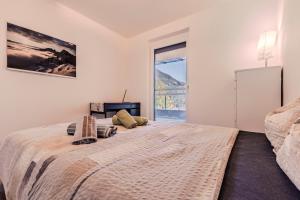 Voodi või voodid majutusasutuse Penthouse in den Bergen toas