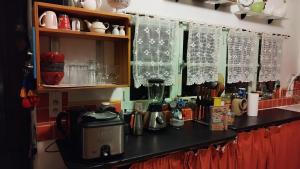 a kitchen counter with a coffee maker on it at UNE MAISON SUR UNE PRESQU'ILE in Port-Saint-Louis-du-Rhône