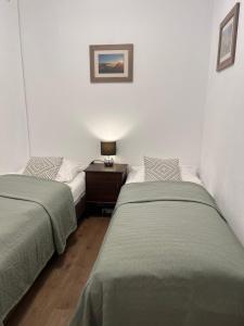 Postel nebo postele na pokoji v ubytování Appartement Malejo am Hochkönig + 42 fotografií