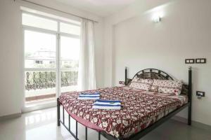 Postel nebo postele na pokoji v ubytování Dona Rosa Holiday Apartment + 22 fotografií