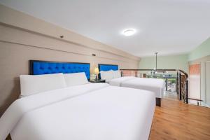Φωτογραφία από το άλμπουμ του April Fair Duplex Apartment Guangzhou South Railway Station Ao Yuan Yue Shi Dai Branch στο Γκουανγκζού