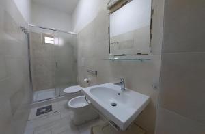 Koupelna v ubytování Brandneue Wohnung In Villa Mit Schwimmbad